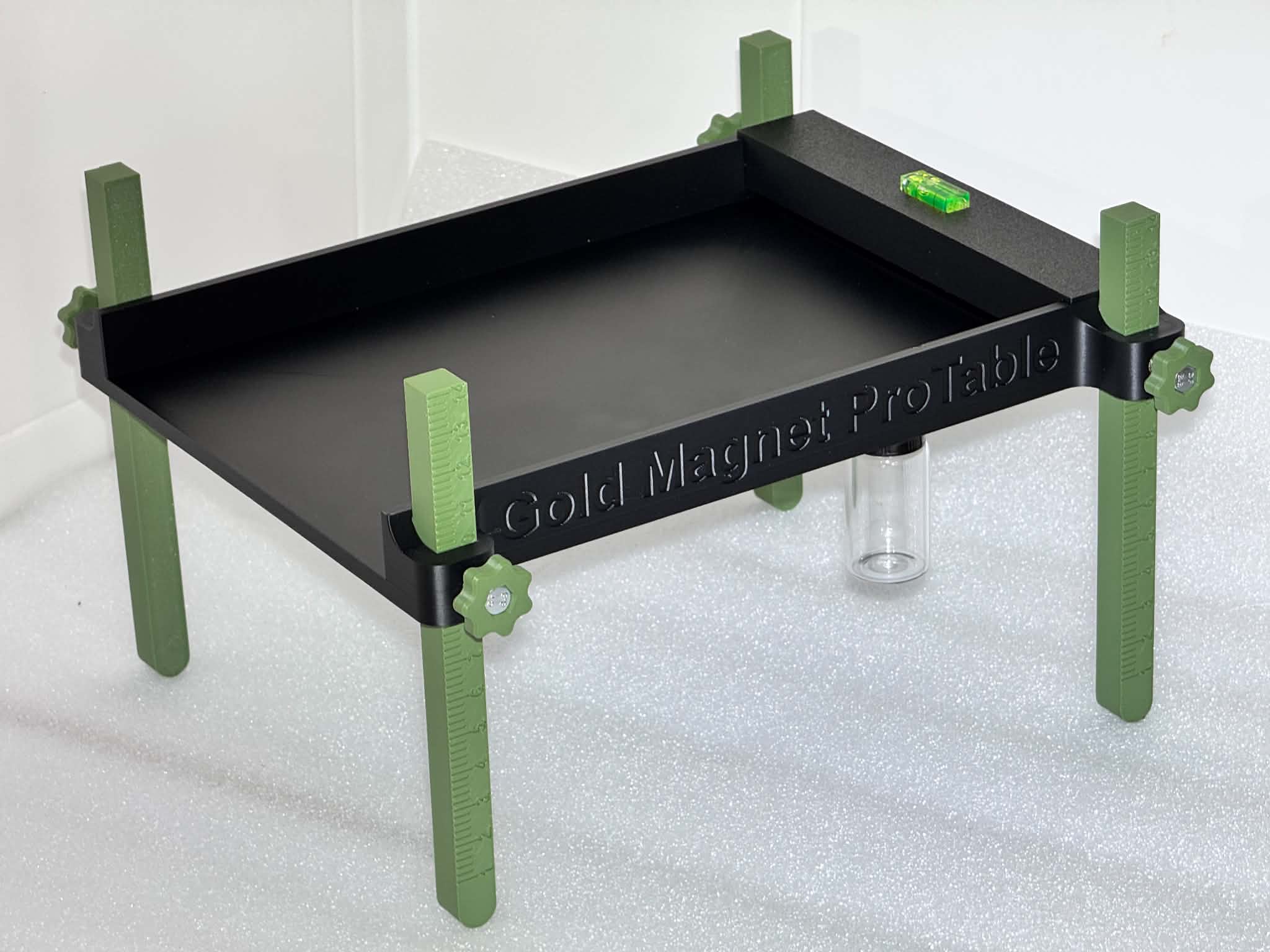 Gold Magnet ProTable — a Miller-style fine-gold finishing table with adjustable legs and a spirit level