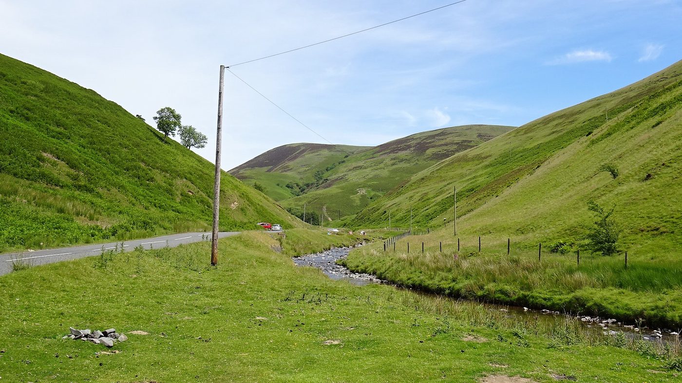 The Mennock Pass road following the Mennock Water down from Wanlockhead, the most accessible gold-panning stretch in the UK.